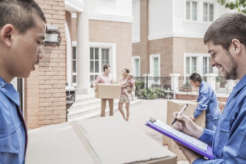 Movers in Emersonpark handling a residential move with boxes and furniture