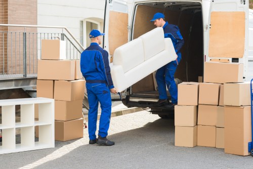 Professional team moving office furniture in Emersonpark