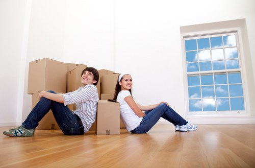Packed boxes and furniture prepared for a removals job