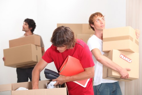 Movers handling a townhouse or apartment relocation in East London
