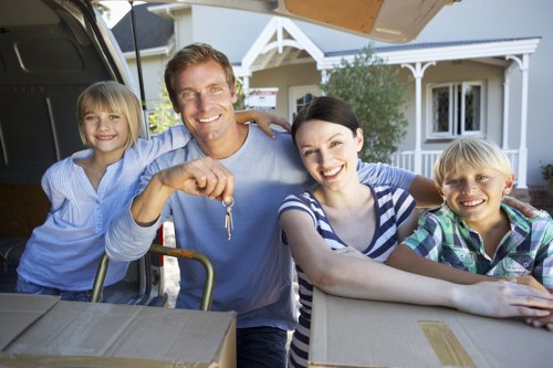 Careful loading of household furniture during a move in Emersonpark