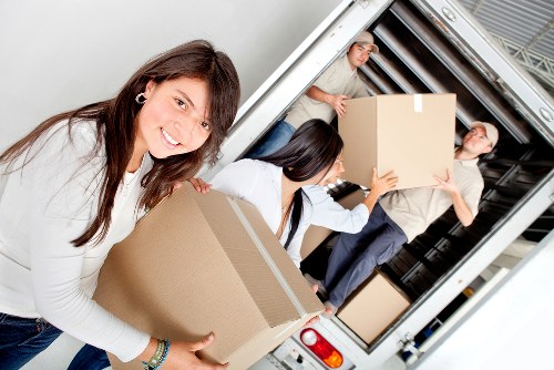 Organised office move setup with labels and furniture placement in Emersonpark