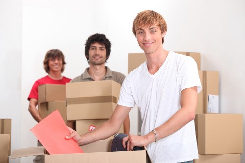 Packing desks, IT equipment, and files for an office move
